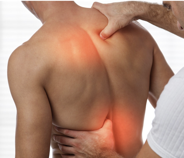 Bodywork therapist performing manual therapy on a man with back pain for relief and recovery